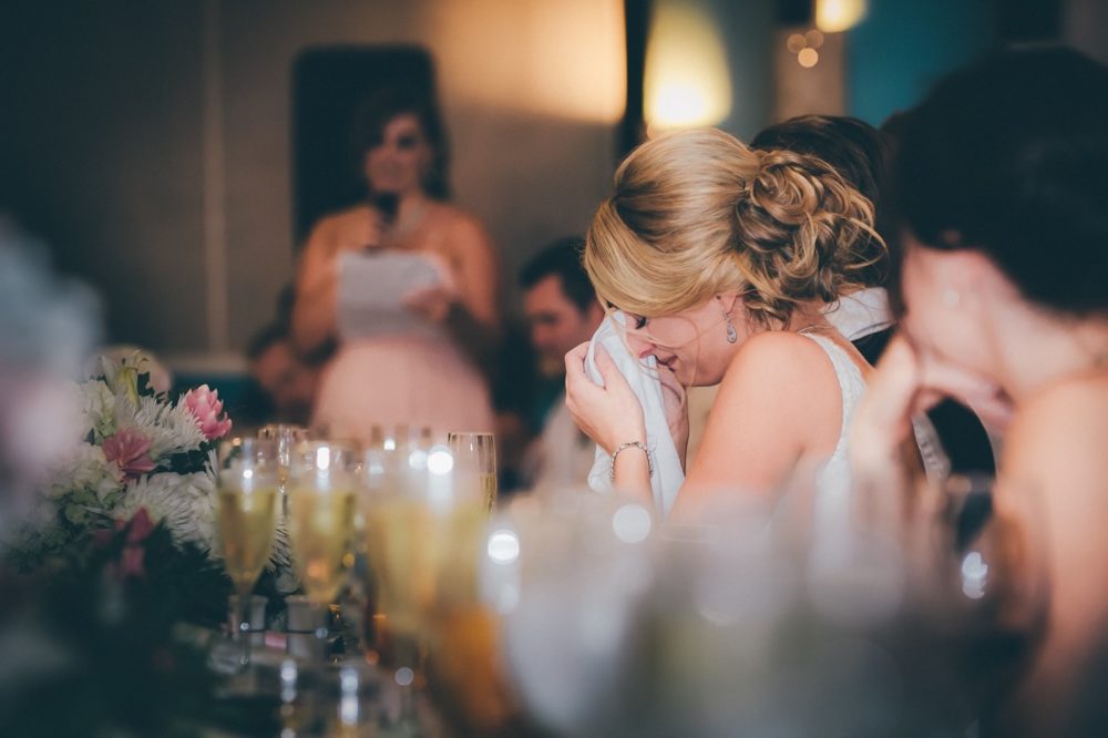 emotional bride pictures during speeches