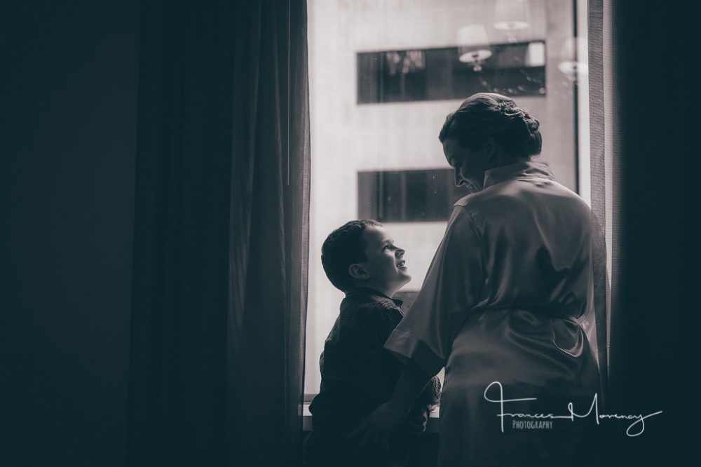 mother and son have a moment by the window in the King Edward Hotel Collingwood Wedding Photographer-4599
