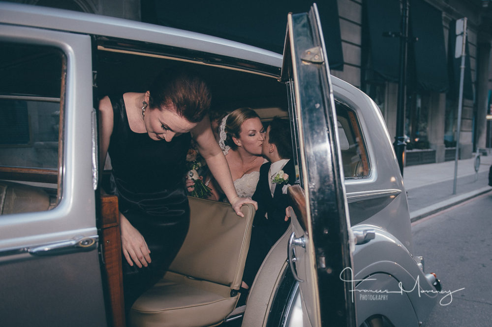 silver rolls royce limo to take them to the wedding as she kisses her son Collingwood Wedding Photographer-4786