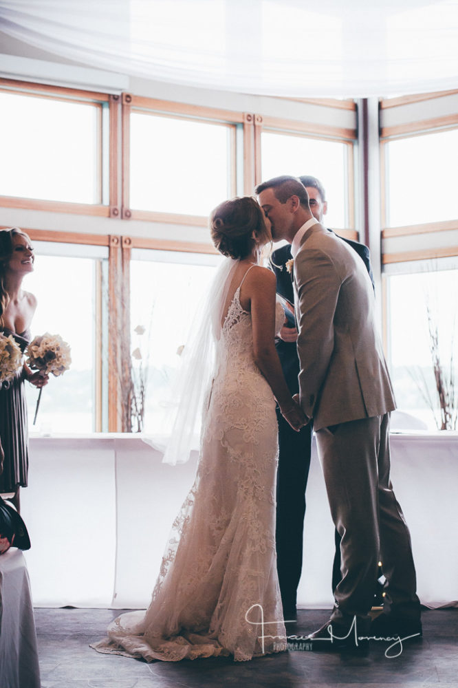 Bride and groom first kiss photographed with windows behind them Collingwood Wedding Photographer-4390