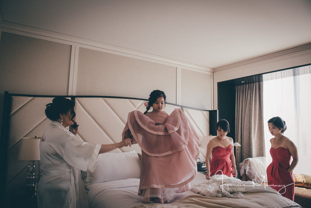 flower girls jumping on bed during bridal preparations The Ritz Wedding Photographer-7941