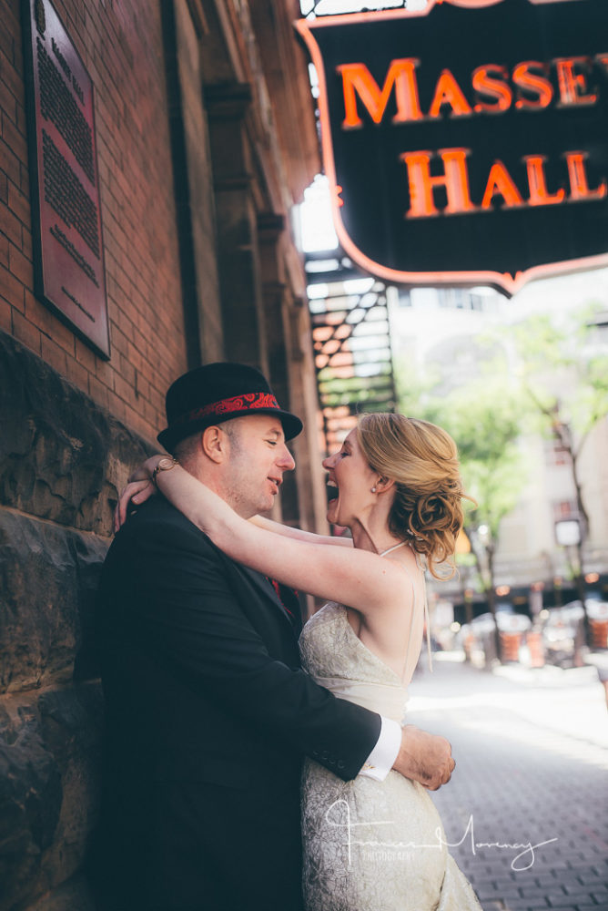bride and groom with red and gold colours on wedding day Massey Hall Wedding Photographer-1158