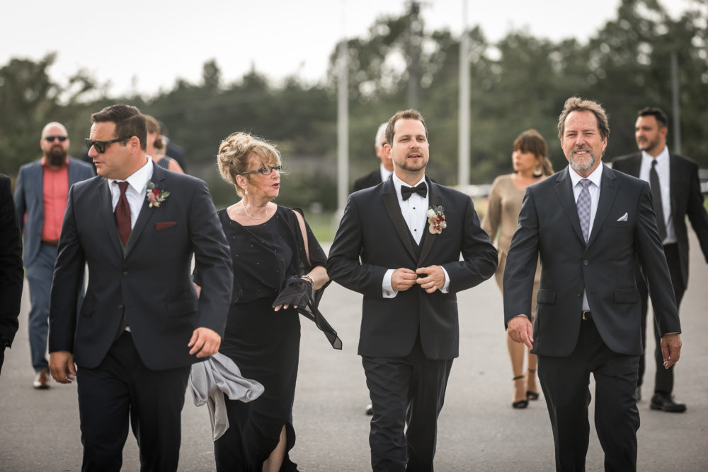 groom walking to ceremony groom walking to ceremony
