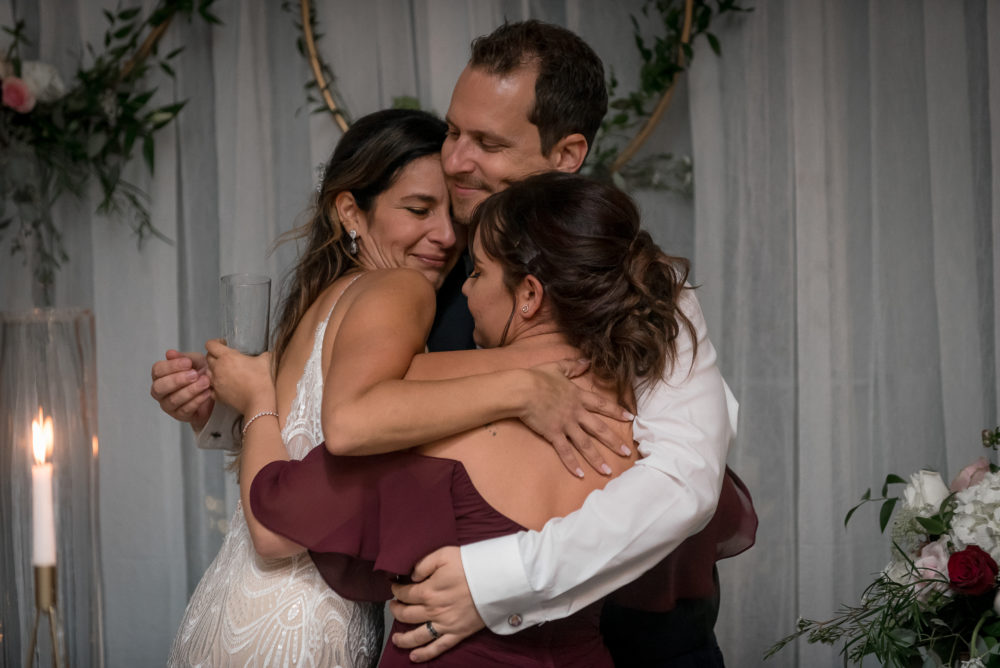 group hug at reception group hug at reception