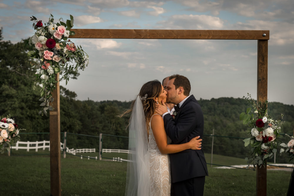 ceremony kiss during golden hour ceremony kiss during golden hour
