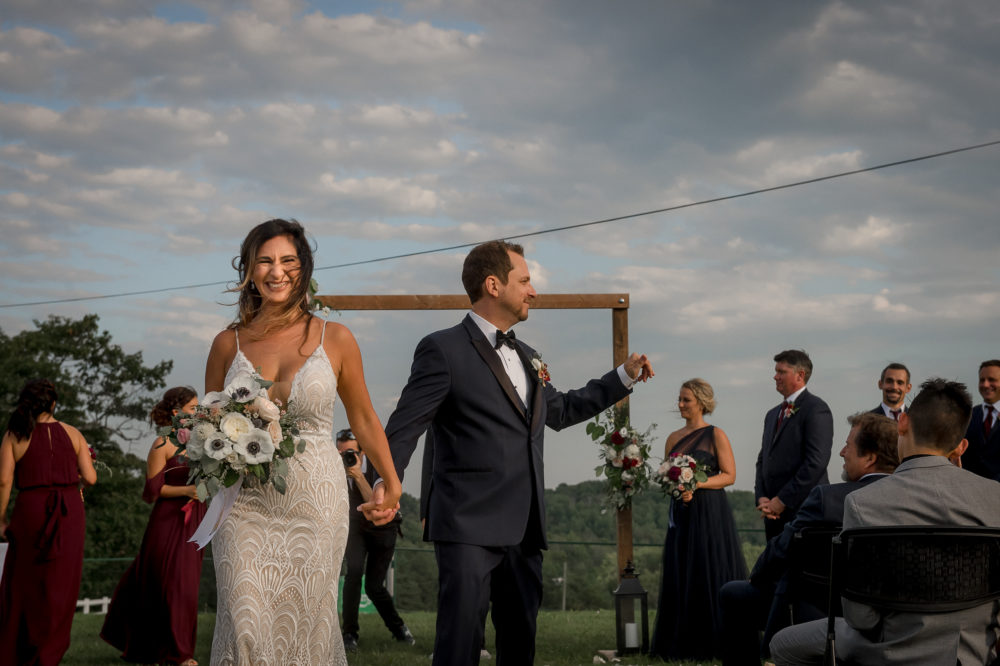 bride groom walking at recessional bride groom walking at recessional