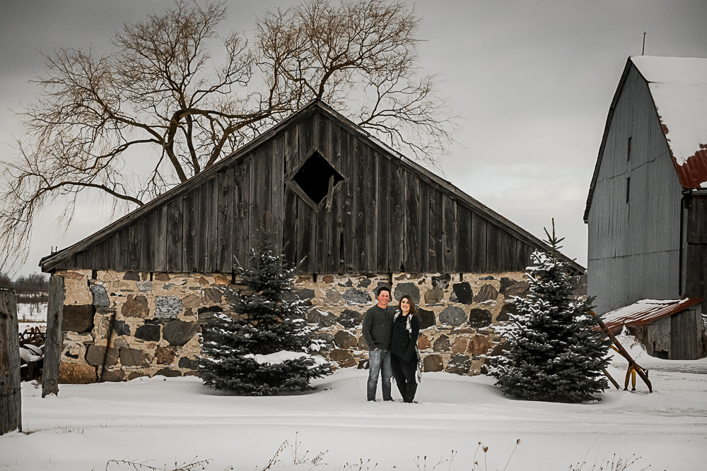 farm scene with engagement couple in Owen Sound, Ontario