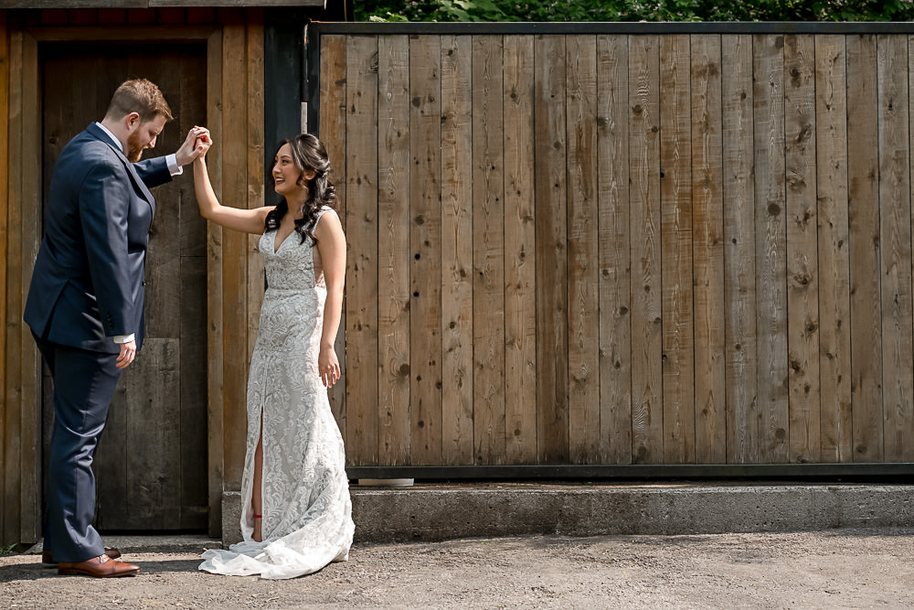 Bride and groom first look at Ancaster Mill