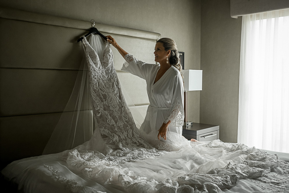 bride getting dress down
