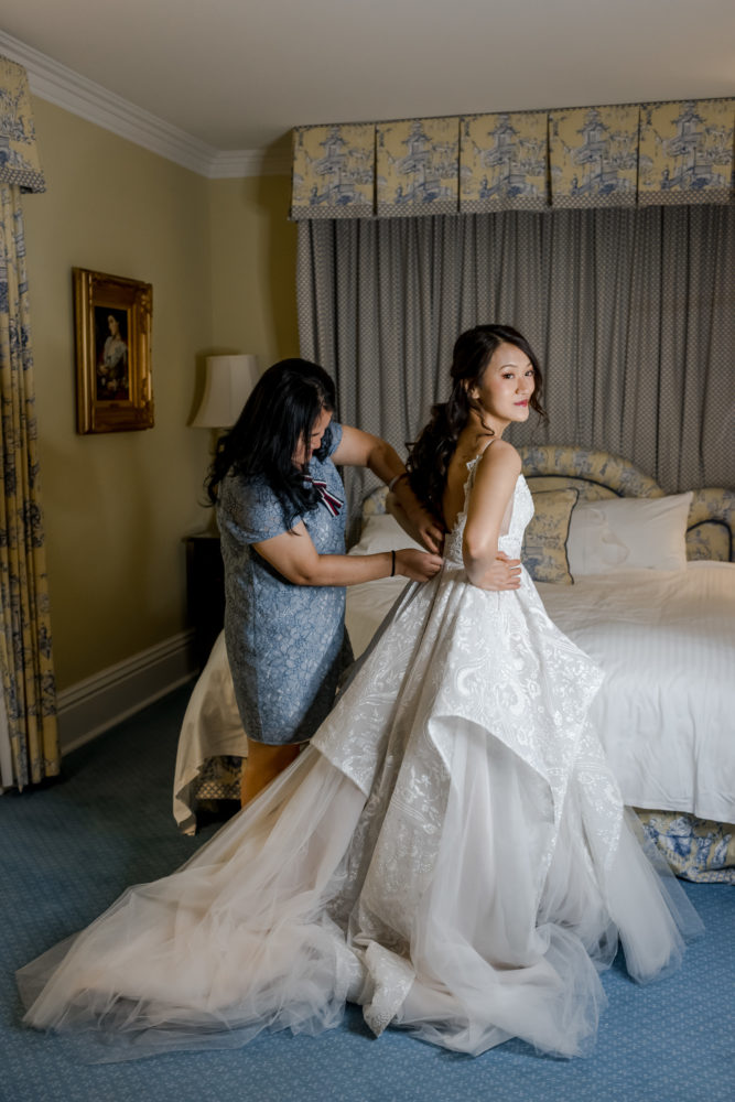bride getting dressed at prince of wales