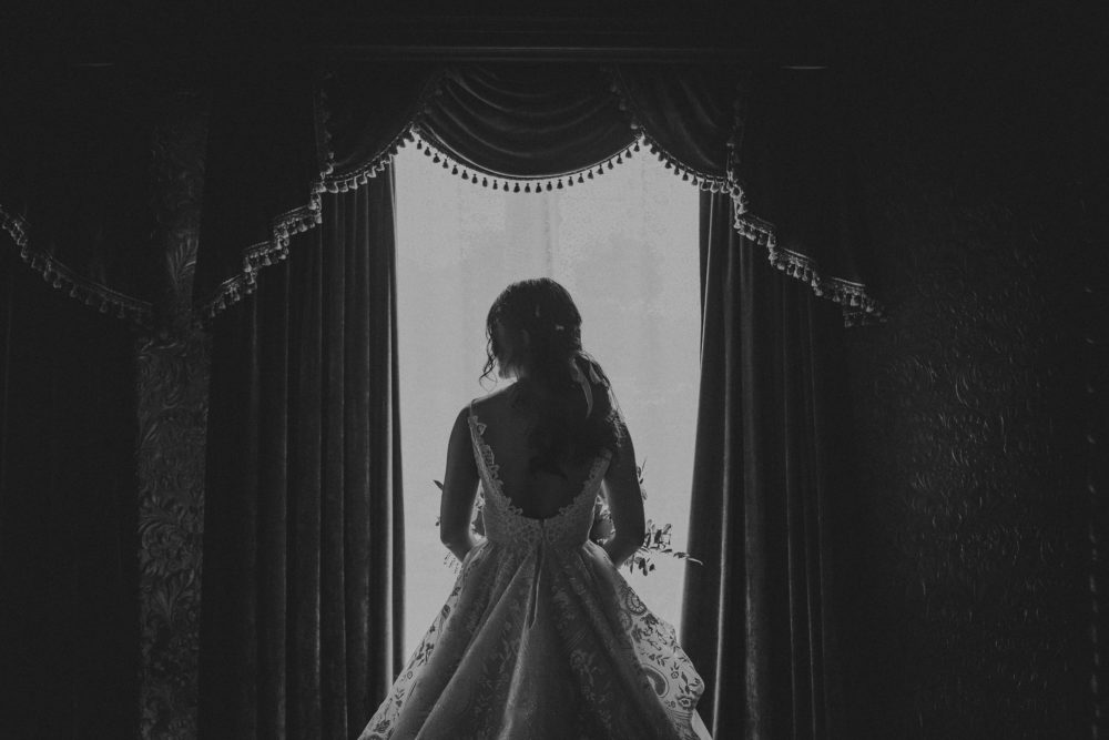 window light portrait with bride