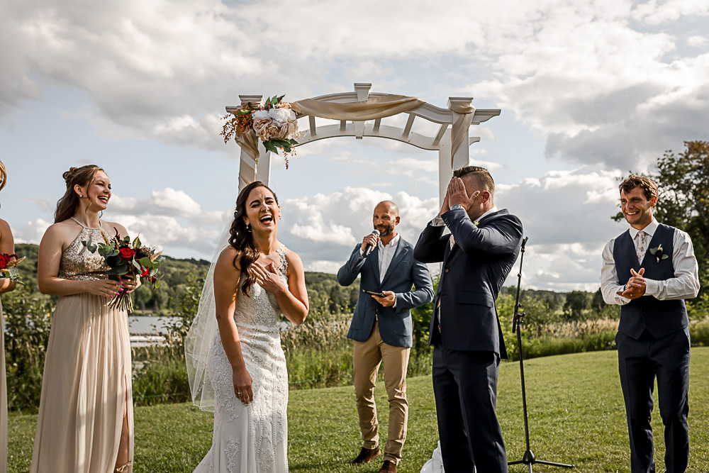 bride groom laughter during ceremony