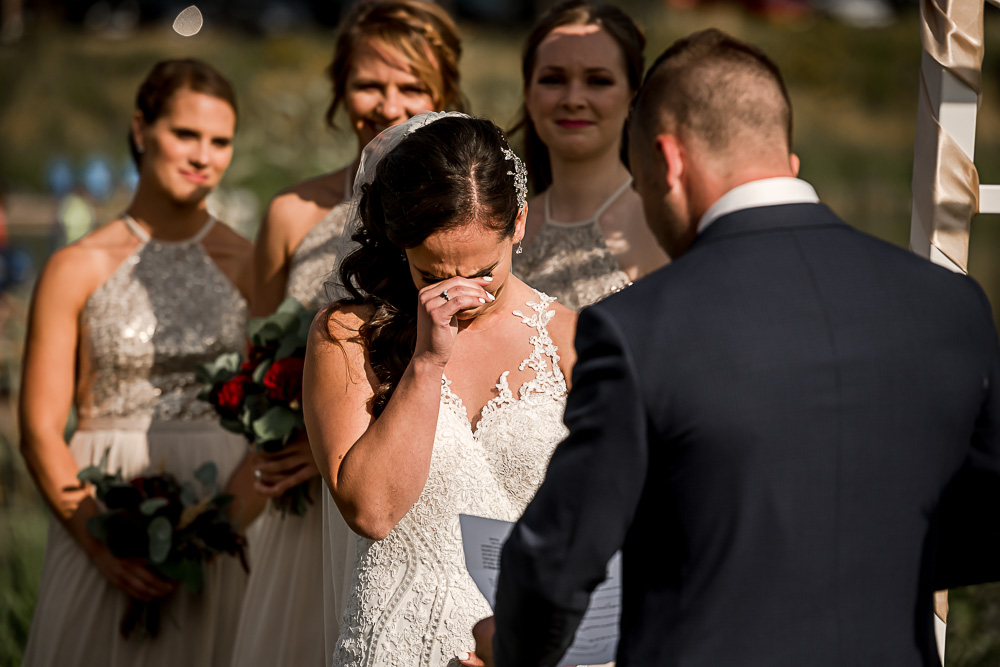 bride cries during vows