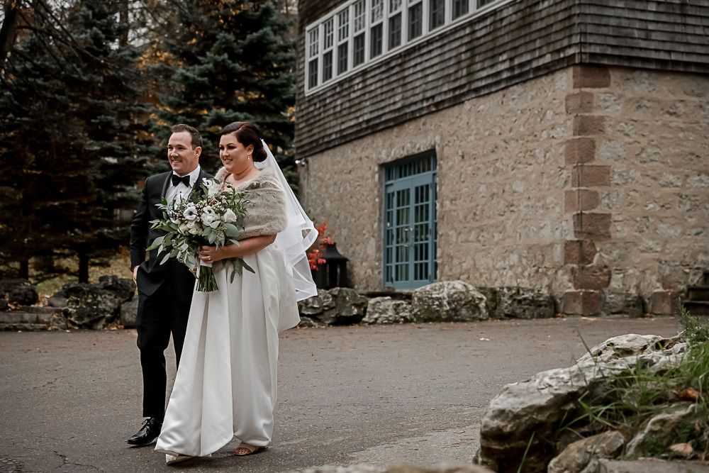 bride groom walking to ceremony at Millcroft