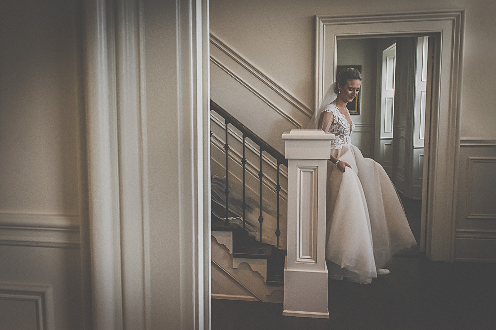 bride coming down the stairs