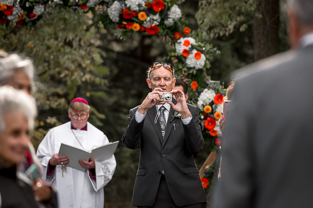 dad photo bombing groom