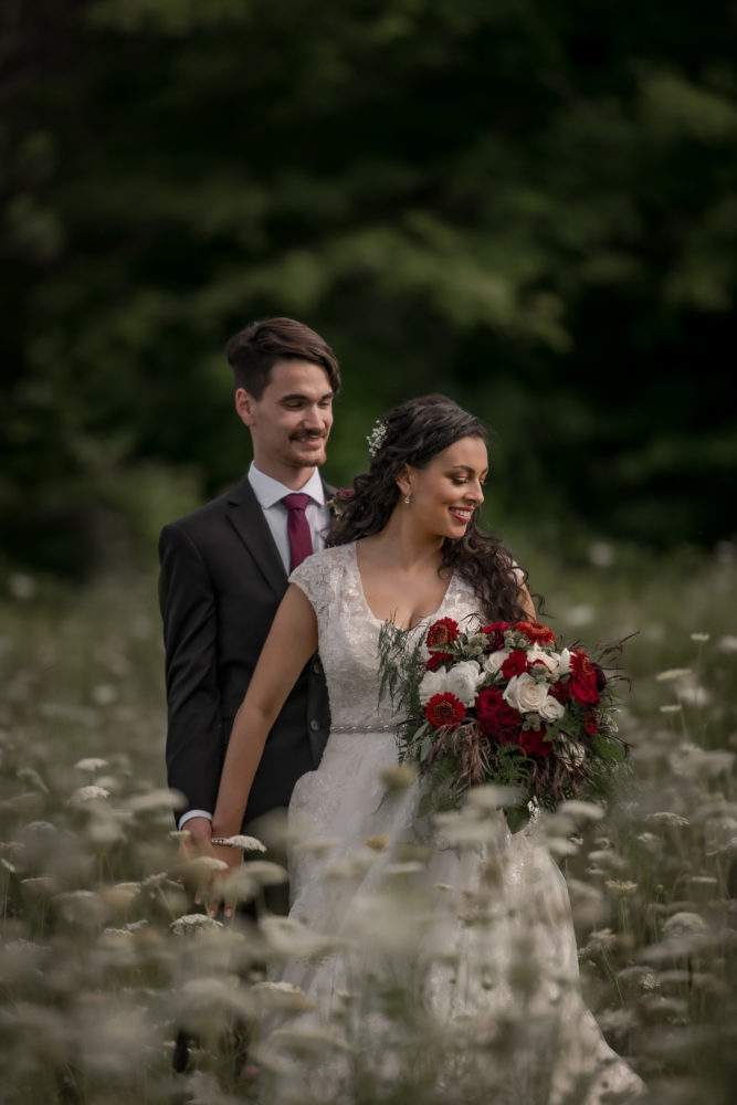 wedding couple portrait with weeds