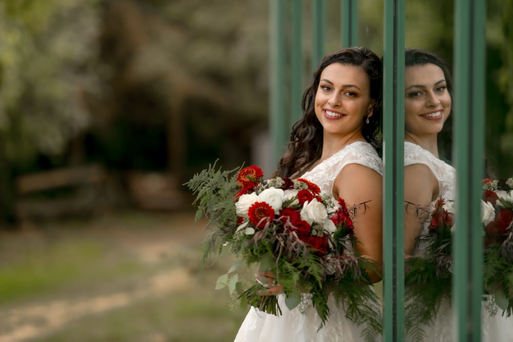 bride portrait against glass at kortright