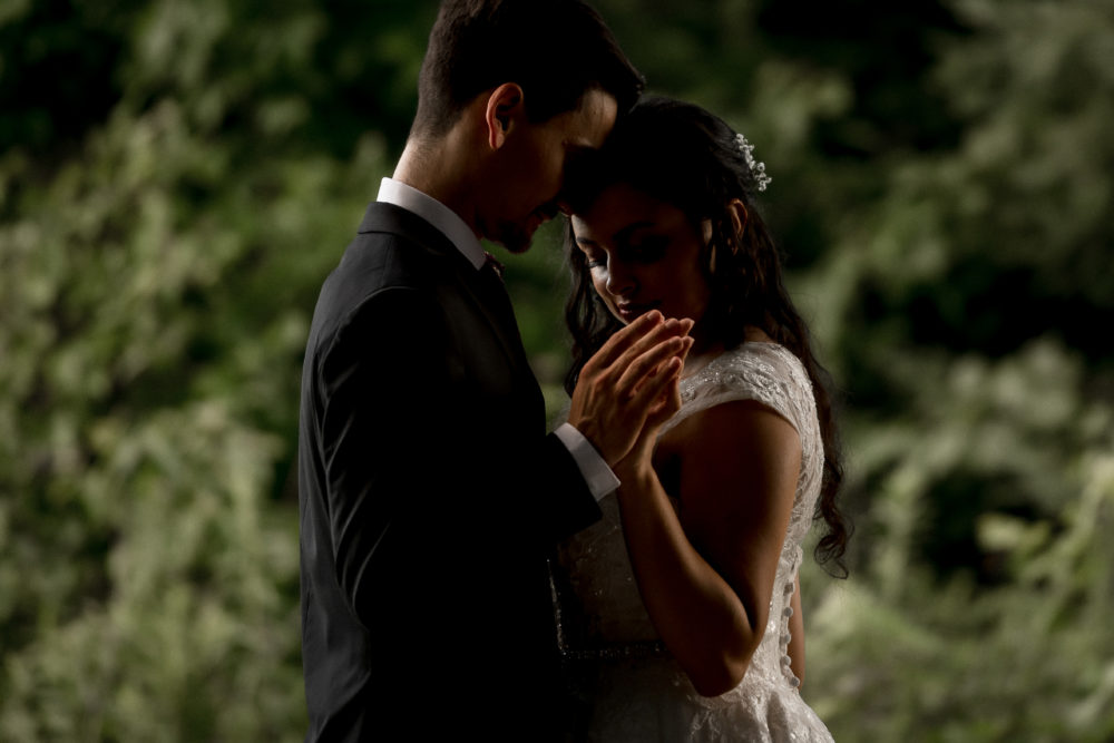 dark and moody bride groom portrait
