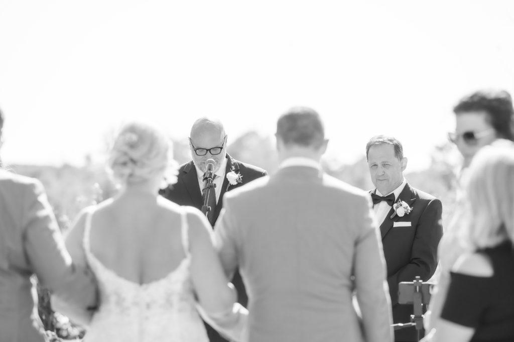 groom first look at wedding ceremony