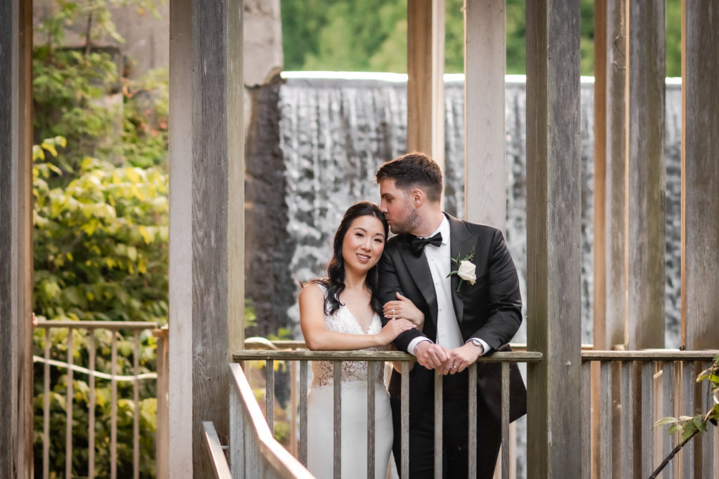 portrait in gazebo by waterfall
