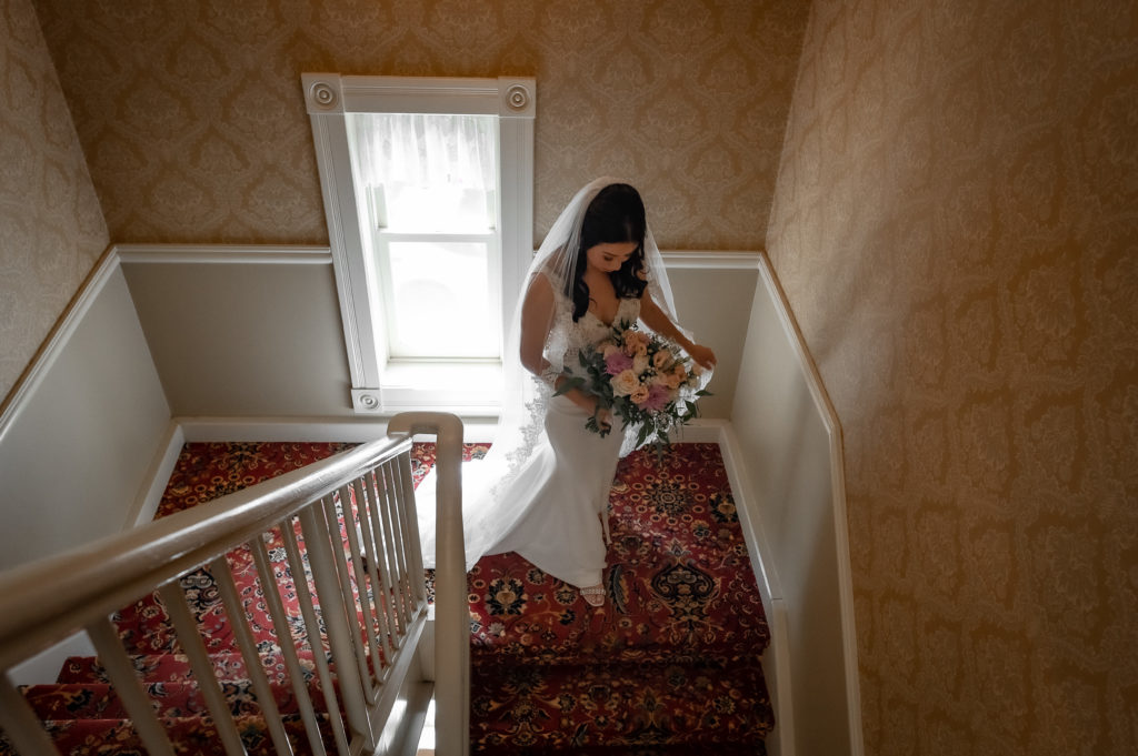 bride walking down the stairs