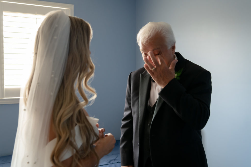 dad cries at bride first look