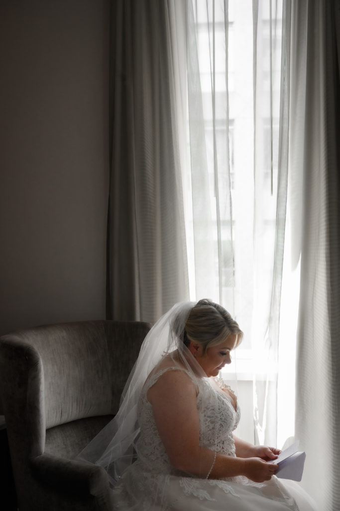 private vow reading photos in hotel room